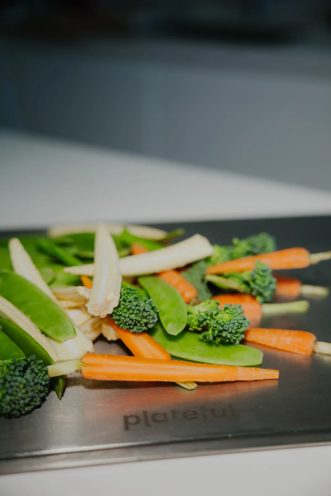 vegetables on titanium cutting board 